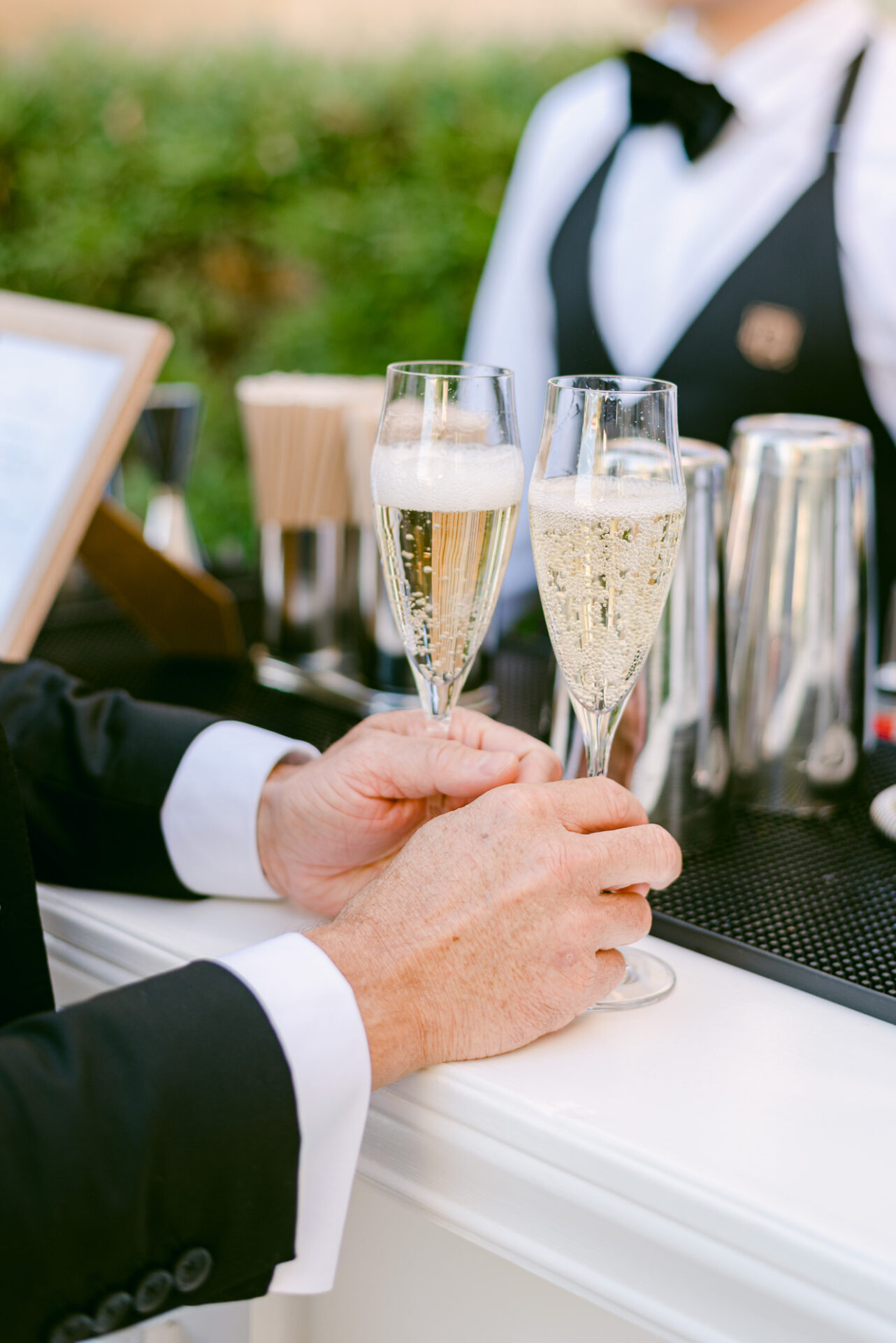 Philoxenia Events professional bar staff serving champagne at Château du Tourreau in Provence, France during a luxury even
