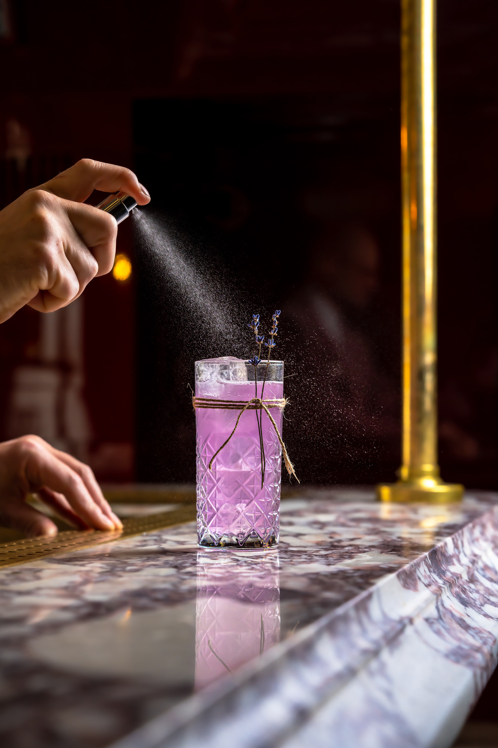 Giorgio Tosato, aka the Notorious, preparing a lavender-based signature cocktail with homemade ingredients at a luxury event by Philoxenia Events London