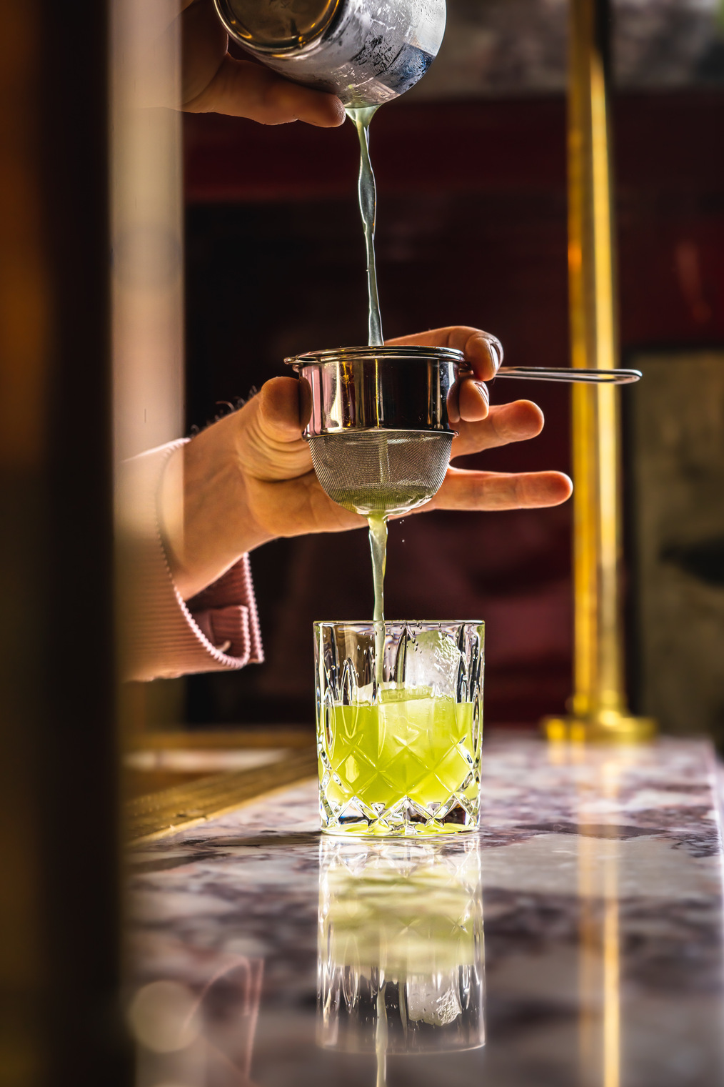 Giorgio Tosato, aka the Notorious, preparing a signature cocktail for a luxury event with Philoxenia Events London.